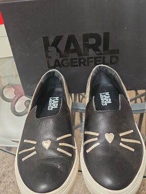 Karl Lagerfeld Paris Black Leather Slip-On Sneakers with Gold Cat Accents